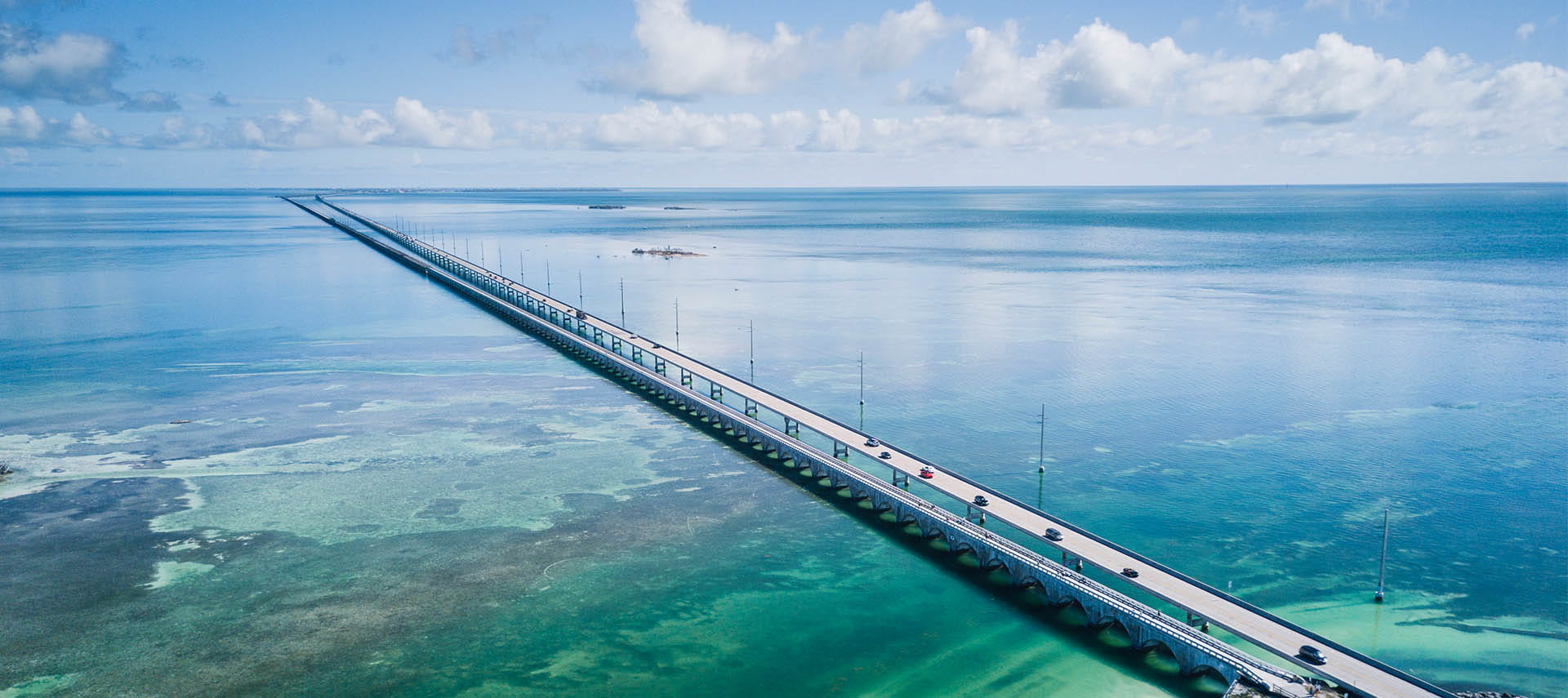 Long bridge in Florida Keys over beautiful clear water.