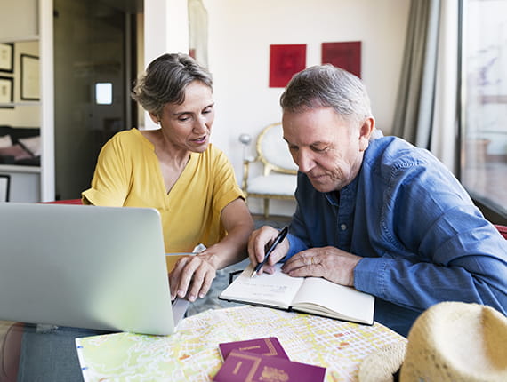 Mature couple reviewing plans