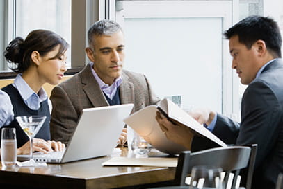 People looking at documents