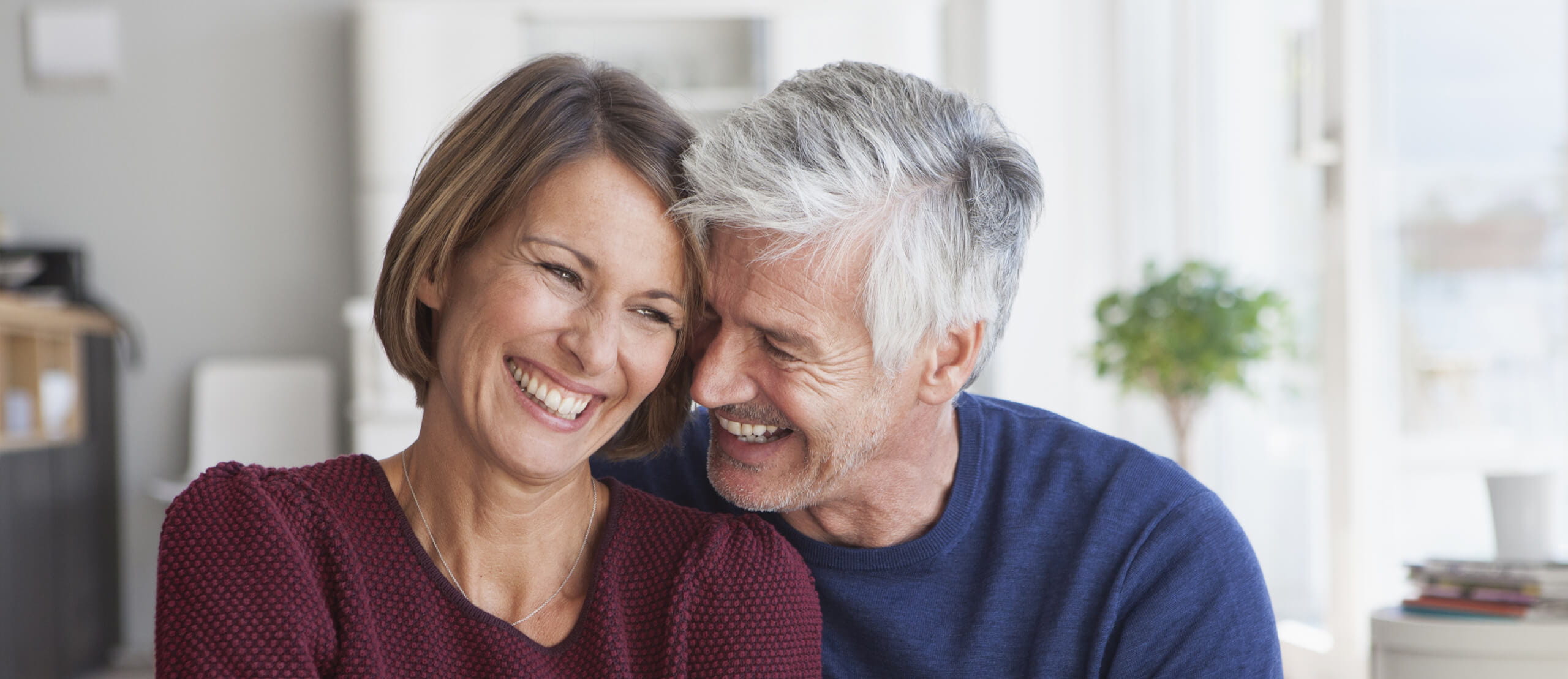 Early retirement couple embracing each other