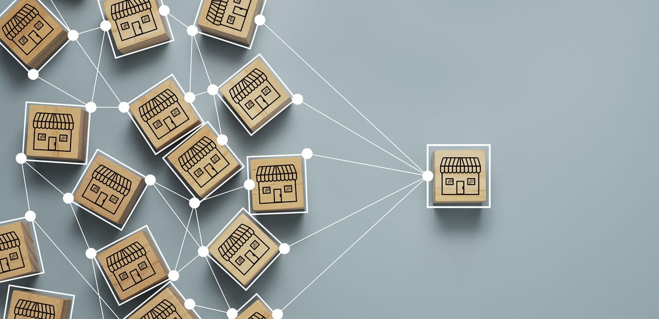 Multiple boxes on a table connected to on single box by a line